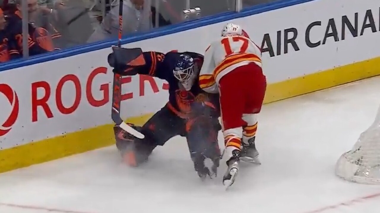 Flames' Milan Lucic ejected for hit on Oilers goalie Mike Smith