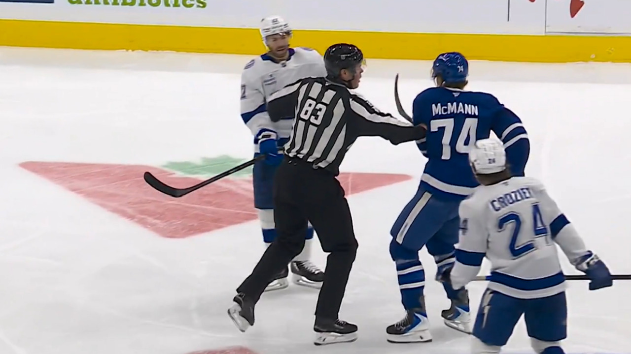 McMann chops stick down on Bjorkstrand's helmet, receives match penalty