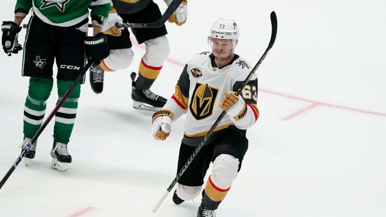 Justin Bieber is wearing a Max Domi Coyotes jersey