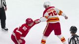 Flames’ Pospisil fights Red Wings’ Shine after hit on Brzustewicz