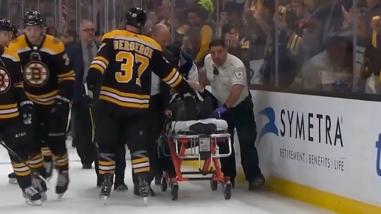 Off-ice official injured by pane of glass as fans celebrate Bruins goal  against Hurricanes - Sportsnet.ca