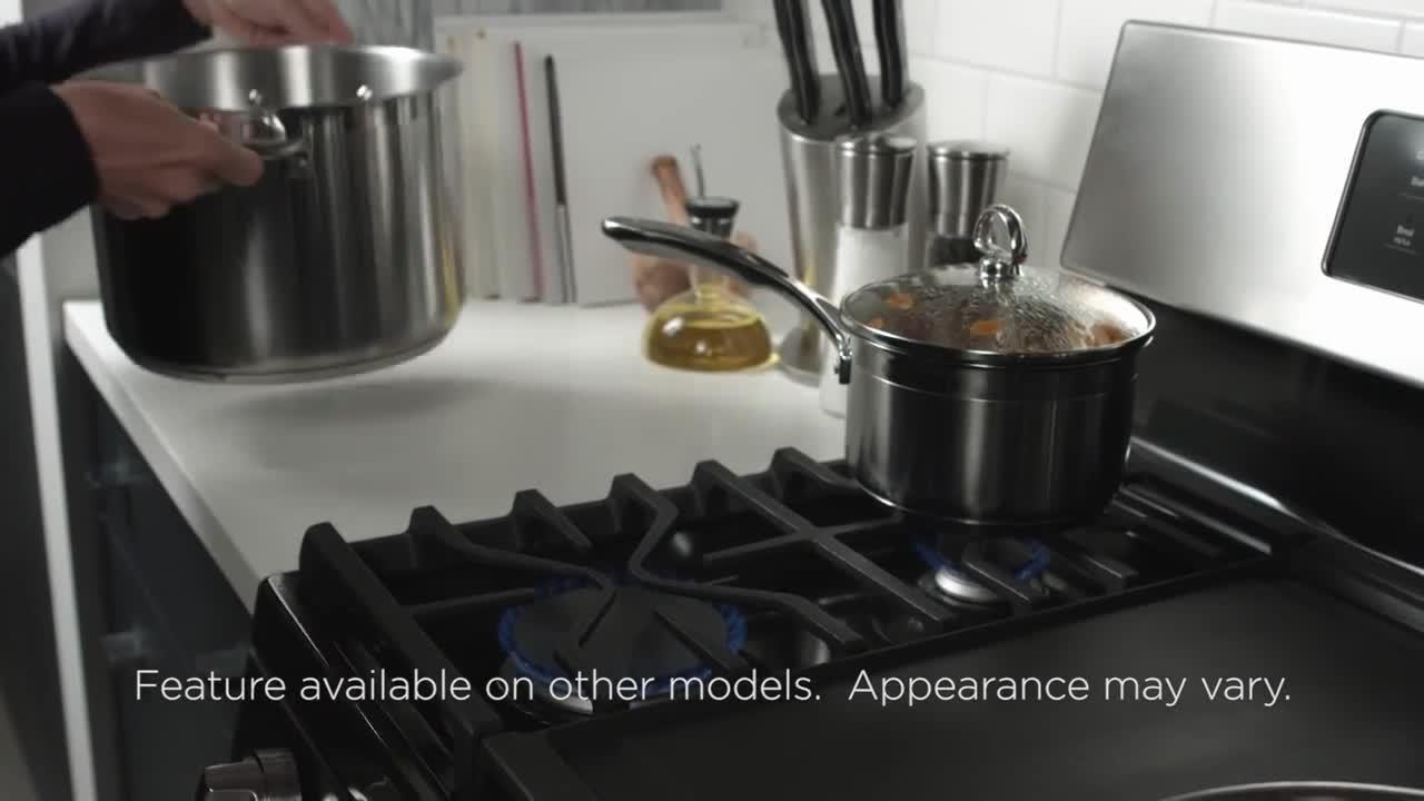Premium Vector  Hot frying pan on a gas stove cook dinner at home