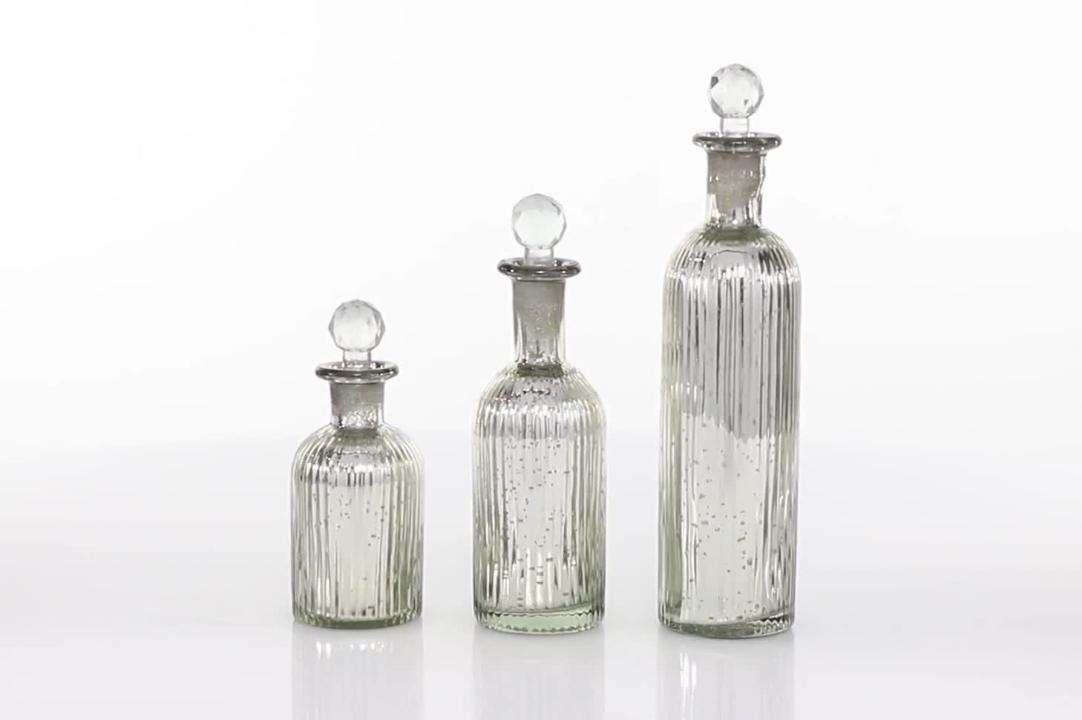 Download Litton Lane Rustic Fluted Glass Bottles With Clear Glass Stoppers Set Of 3 28886 The Home Depot