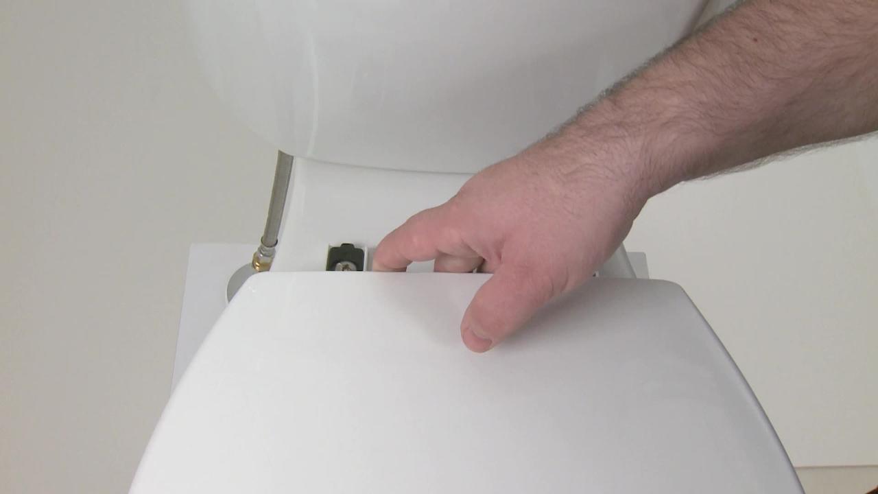 KOHLER Brevia Round Closed Front Toilet Seat with Quick-Release Hinges in Almond