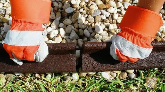 Vigoro EcoBorder 4 ft. Brown Rubber Landscape Edging (48-Count/Pallet) Vigoro EcoBorder 4 ft. Brown Rubber Landscape Edging (48-Count/Pallet)