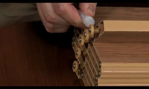 Spectrum Oakmont 36 in. x 80 in. Pecan Vinyl Accordion Door with