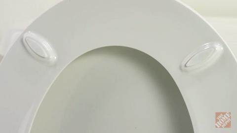 KOHLER Cachet Quiet-Close Round Closed Front Toilet Seat with Grip-Tight Bumpers in Sandbar