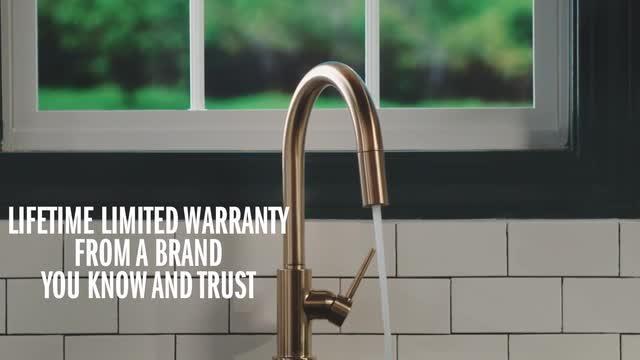 Trinsic Single Handle Pull Down Sprayer Kitchen Faucet with MagnaTite Docking in Champagne Bronze