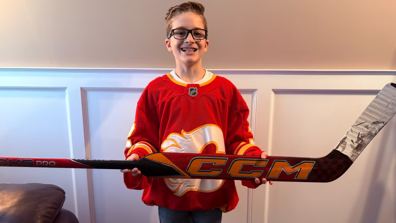 Dustin Wolf makes young fan’s day with heartfelt hockey stick gift