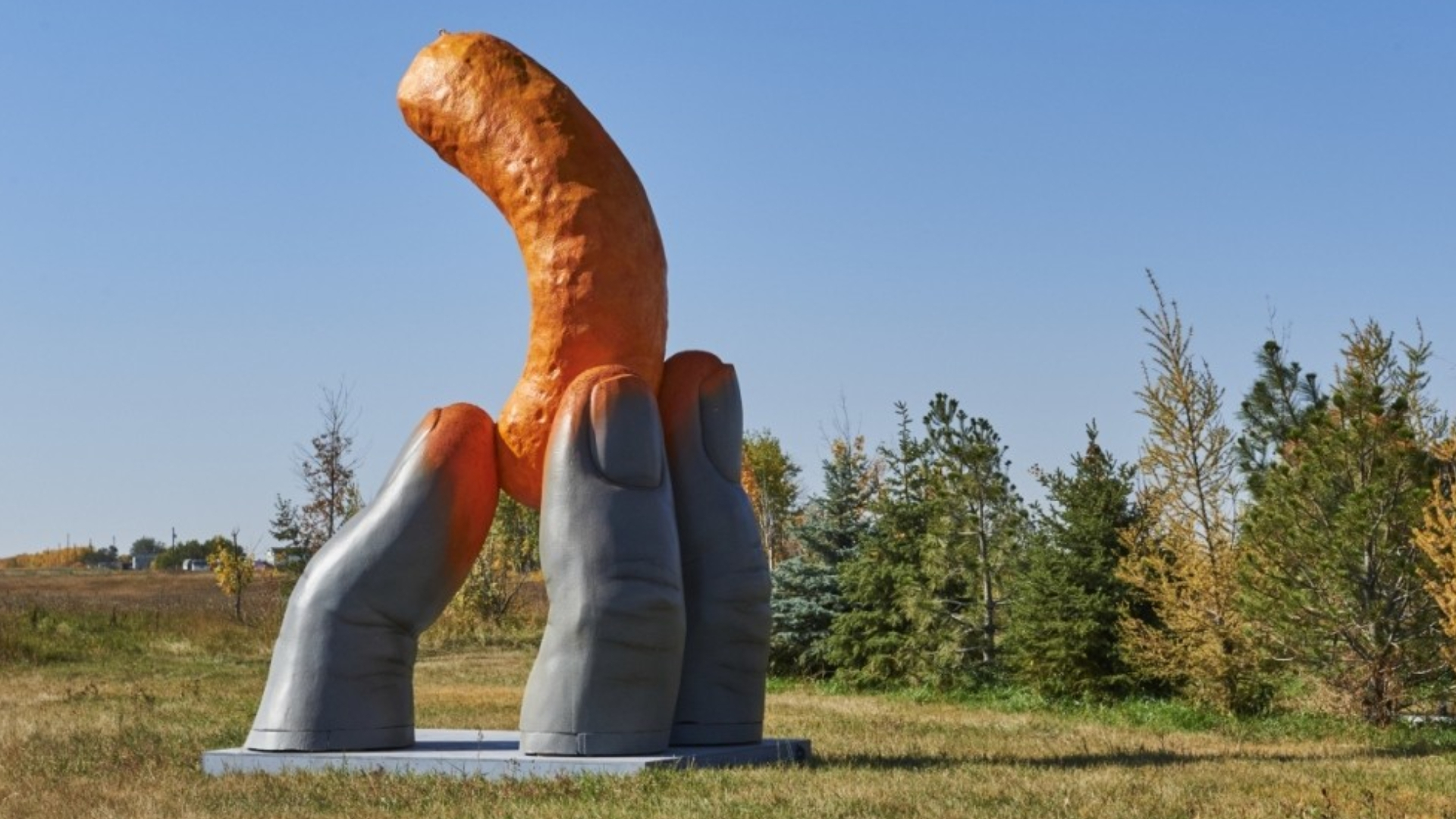 Cheetos reveals 17-foot tall “Cheetle Hand Statue” in Alberta