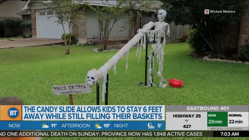 A couple creates a candy slide for safe Trick-Or-Treating
