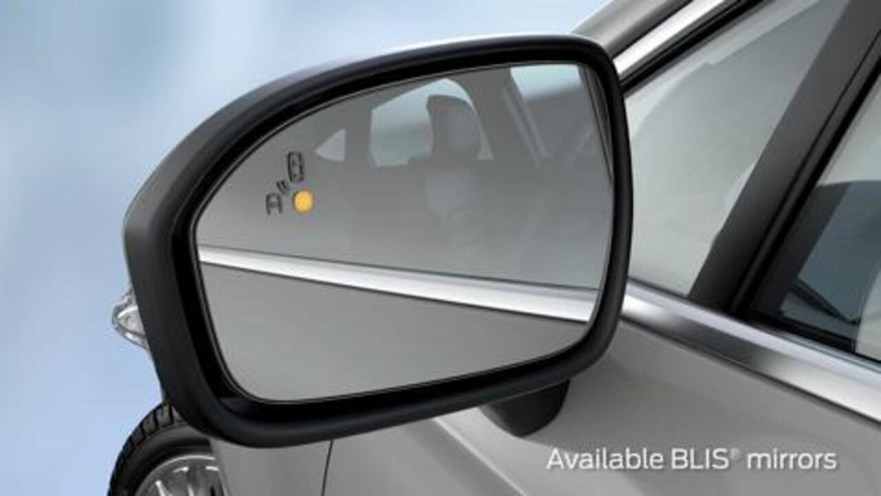 How do I know if my vehicle has heated mirrors and how do I activate them?