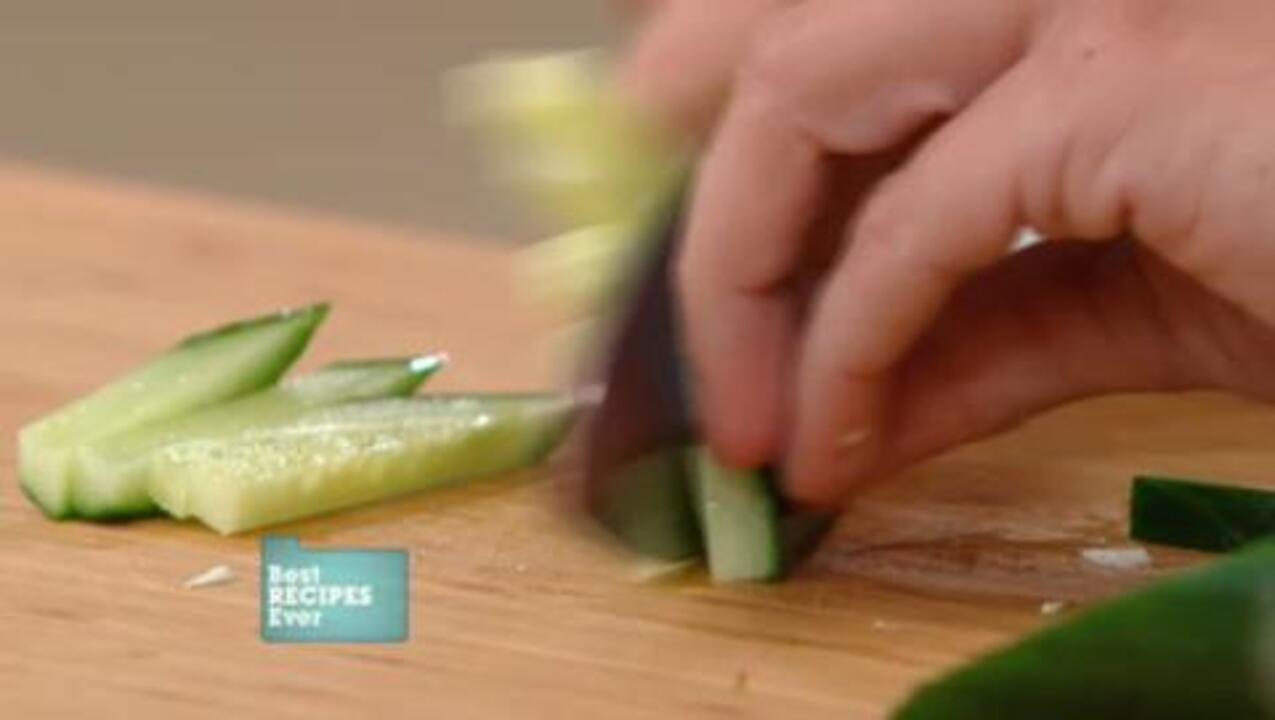 Cutting cucumber for a salad