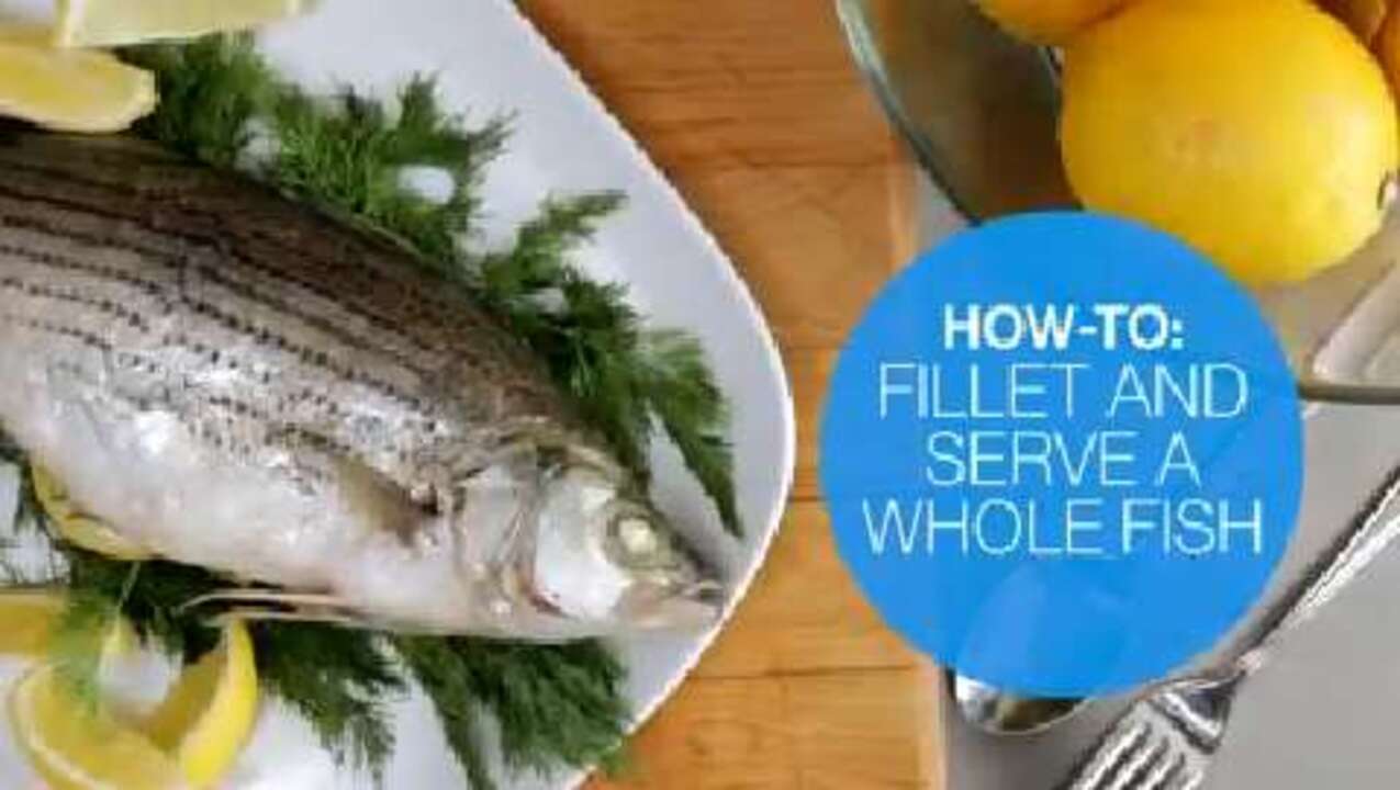 How to fillet and serve a whole cooked fish