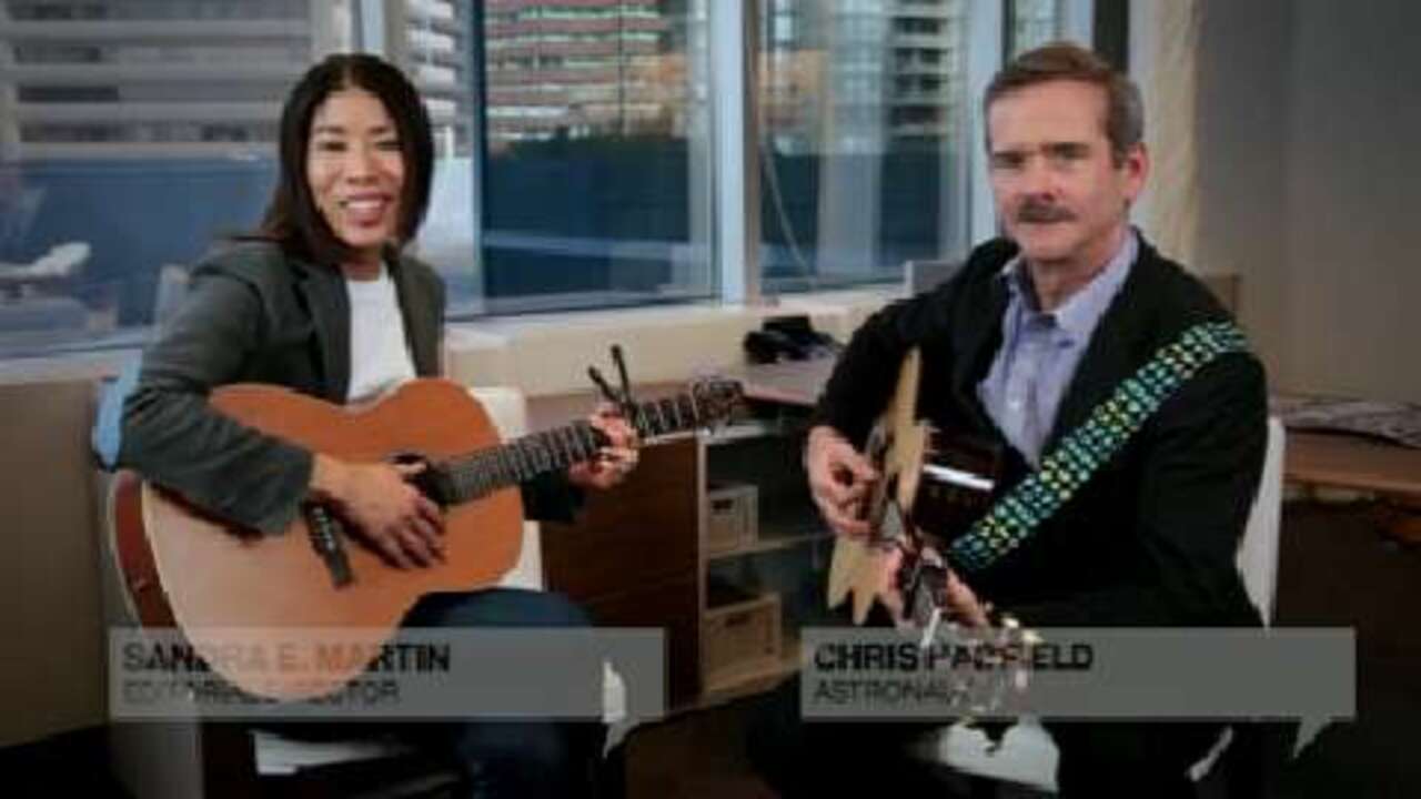 In Canada: Chris Hadfield and Sandra Martin sing together