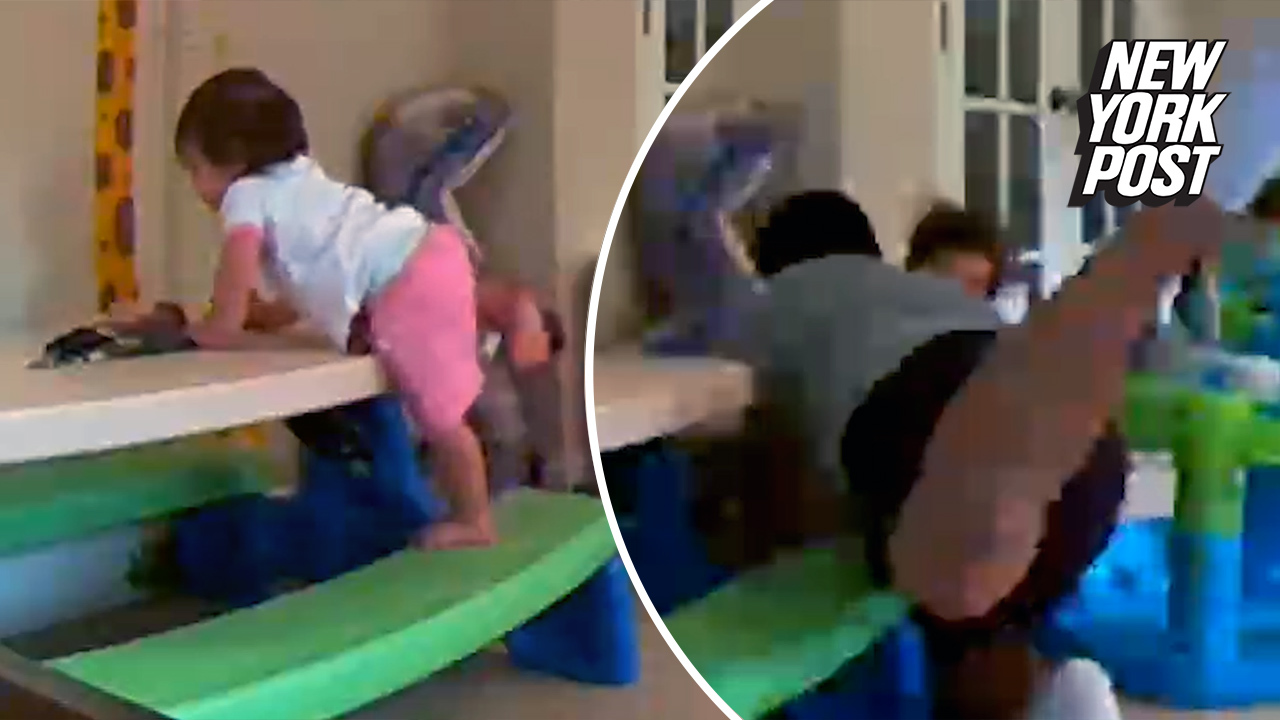 Nice save, Dad! A father with impressive reflexes caught his toddler-age daughter as soon as she fell off a table in their playroom. "She was testing me by climbing the table," he said. 