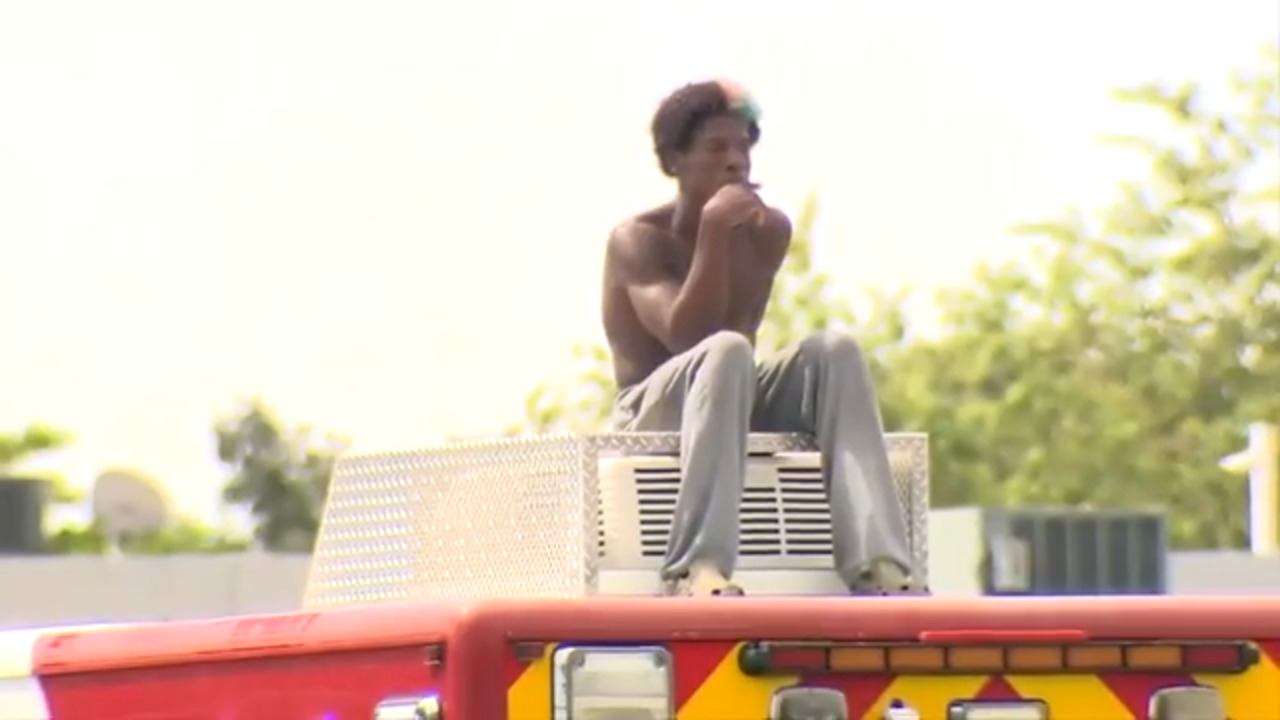 Man climbs on top of Miramar fire rescue truck, refused to come