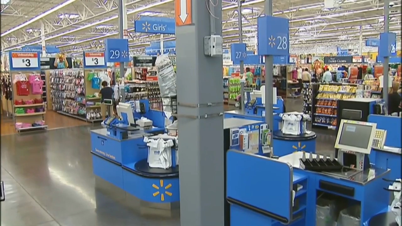 Miami, FL, USA - March 26, 2020: People Going In A Walmart Store On Sunny  Day. Walmart Is The World's Third Largest Public Corporation That Runs  Chains Of Department Stores. Quarantine Due