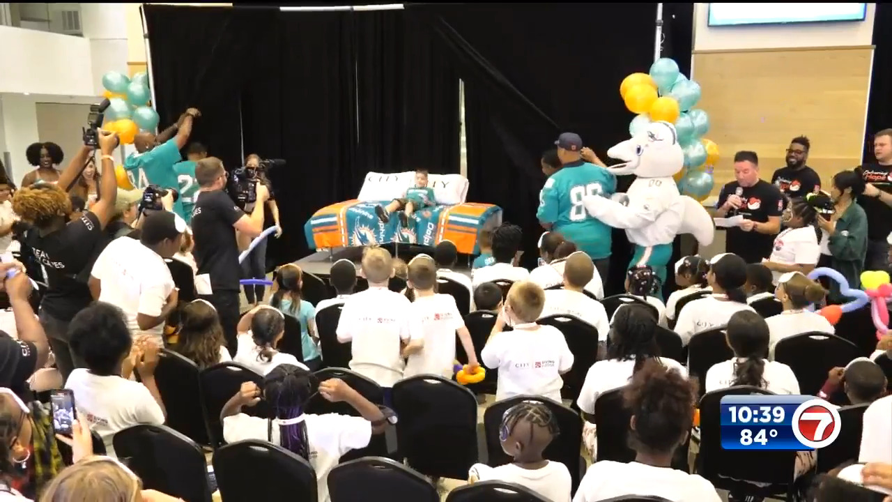 Miami Dolphins Partner with CITY Furniture and Surprise Over 100 South  Florida Kids with Beds at Annual Delivering Hope Event