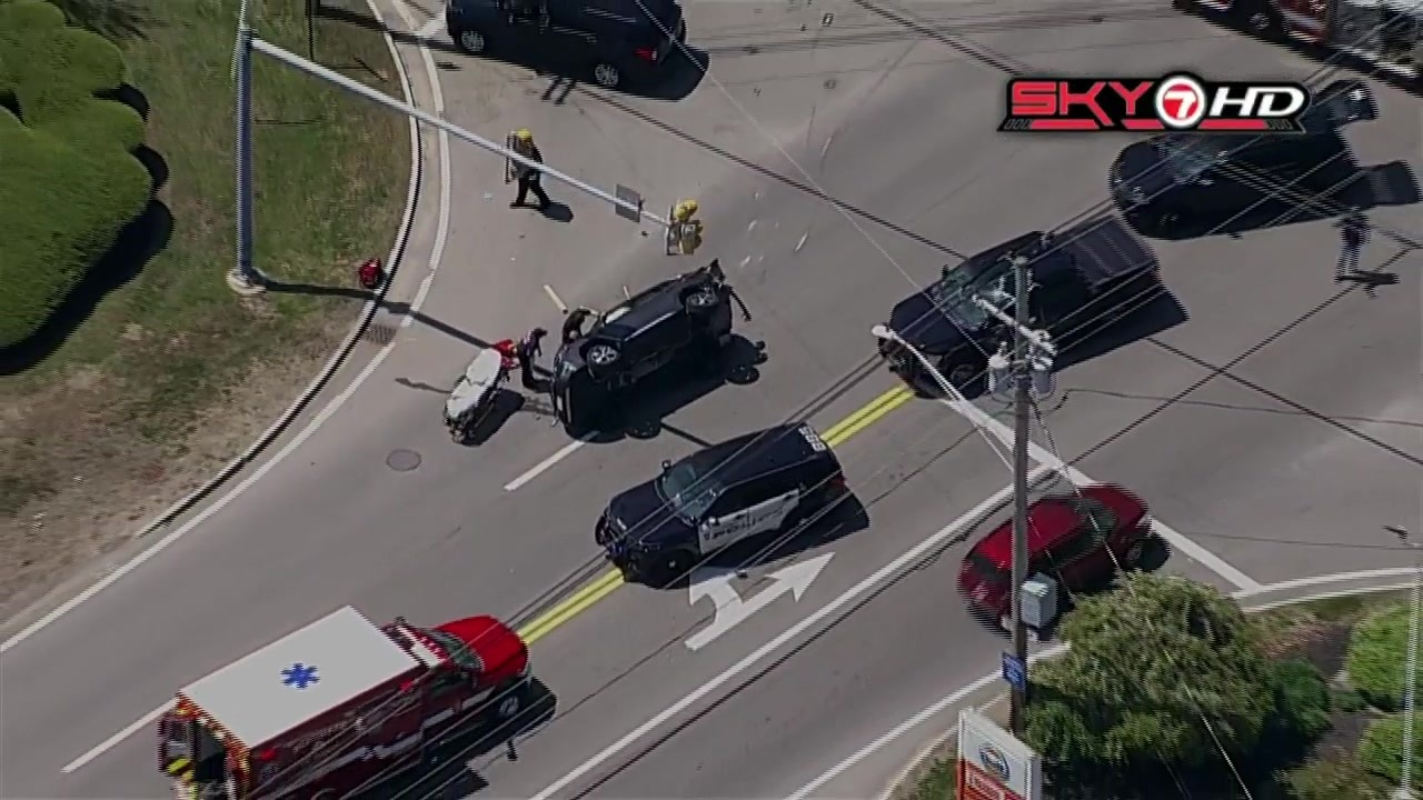 SUV crashes into three cars for sale on Cohasset lot