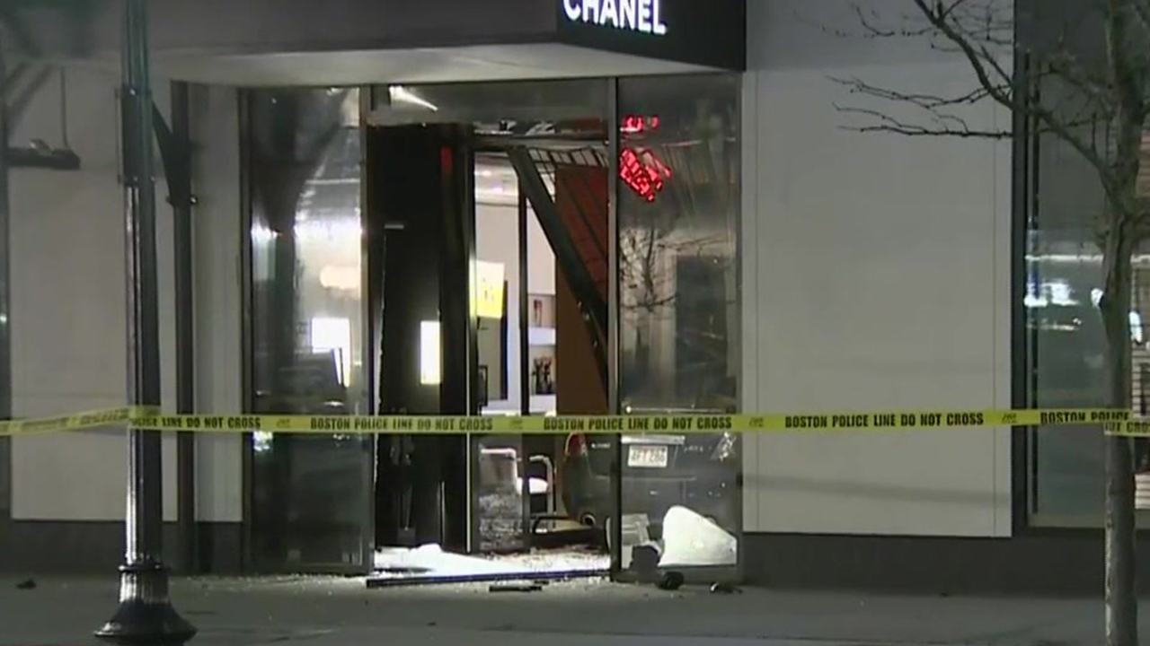 Police Suspects seen fleeing with items after car barrels into Chanel store in Boston