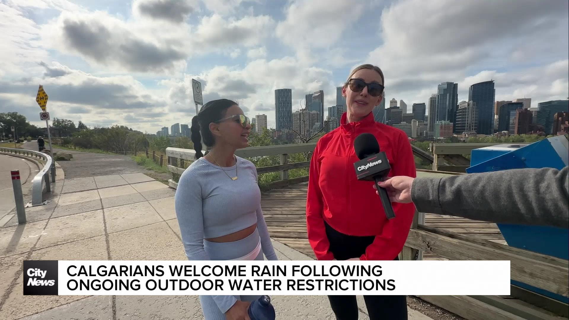 Calgarians welcome rain following ongoing outdoor water restrictions