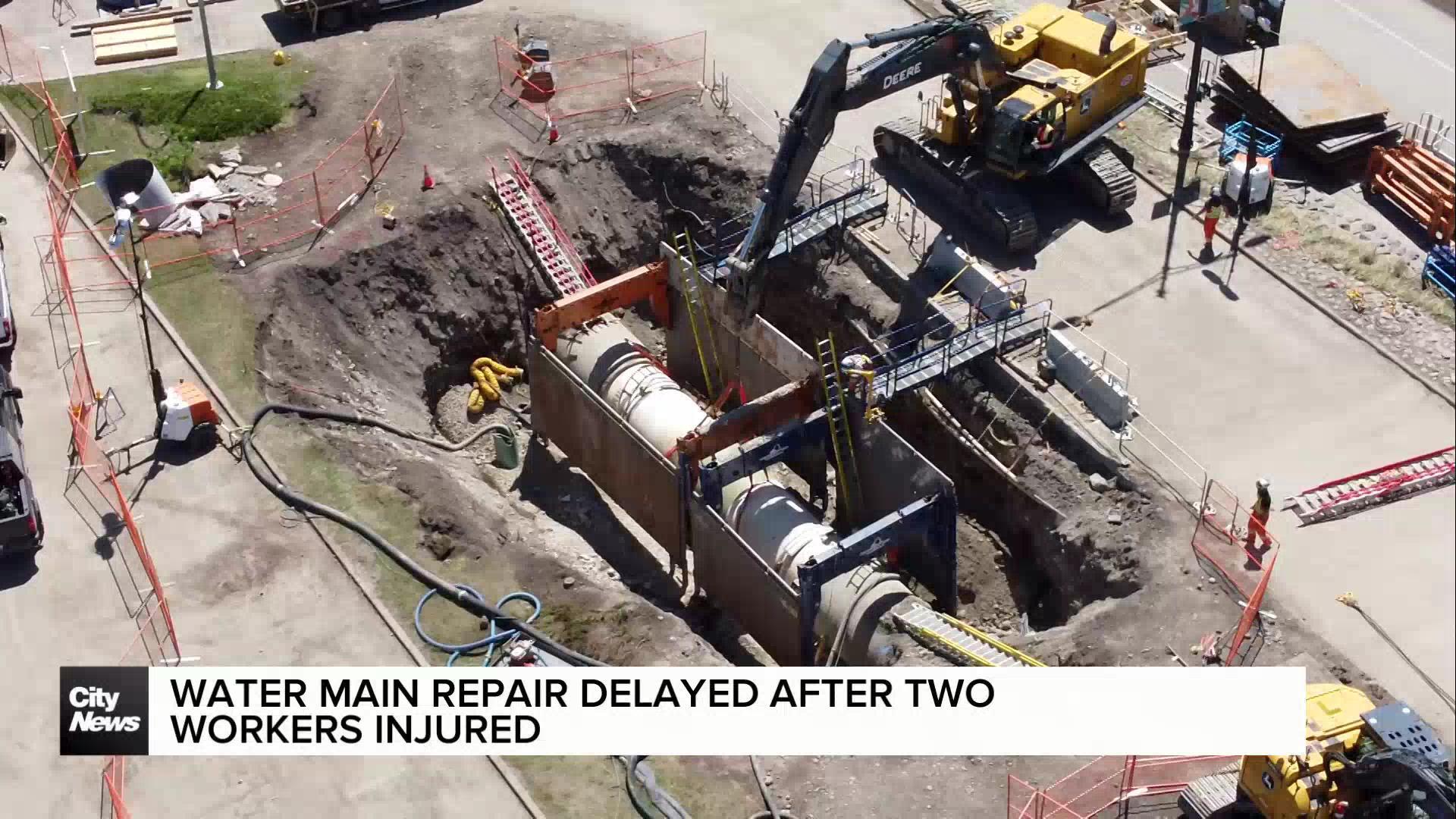 Water main repair delayed after two workers injured
