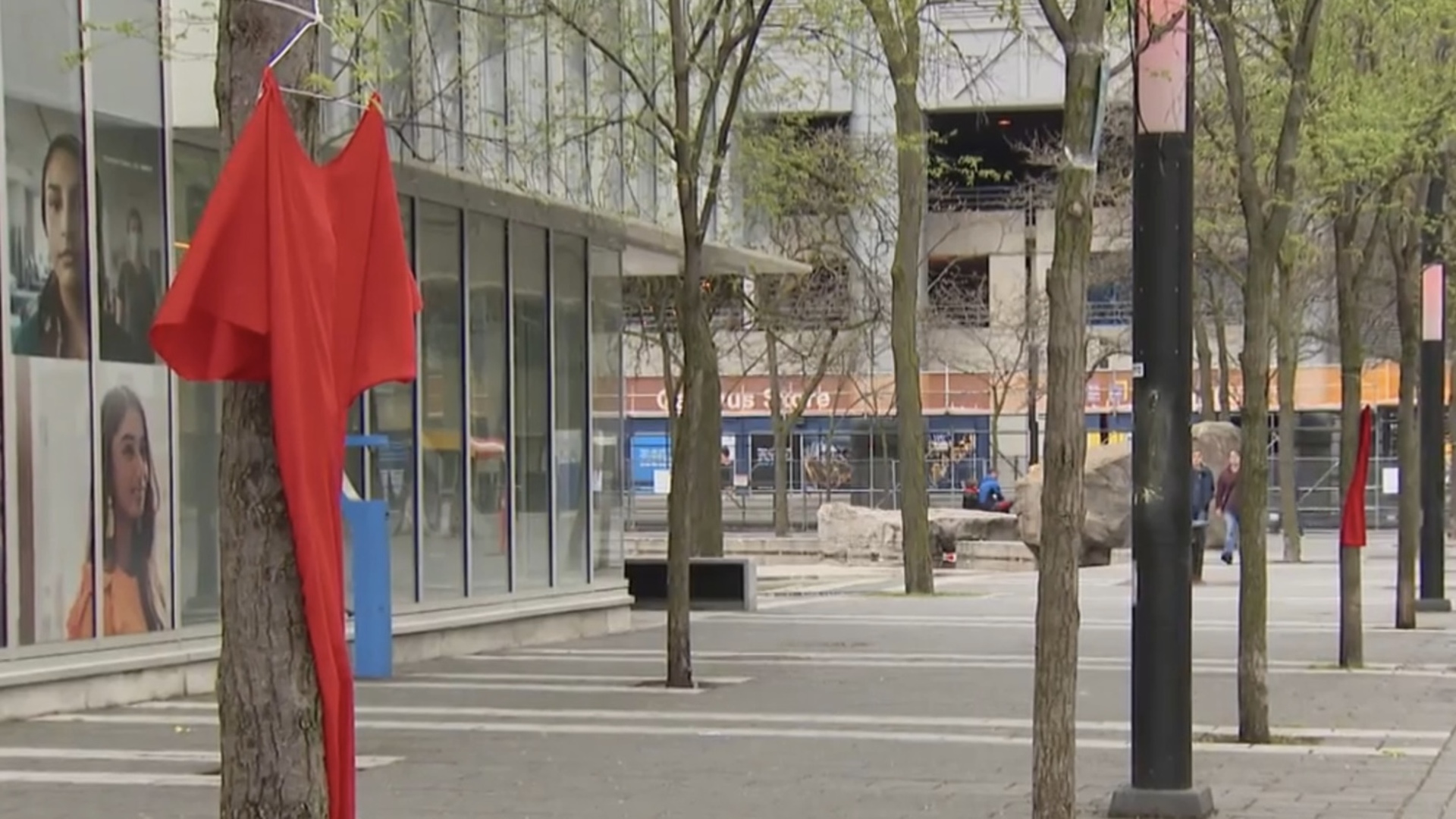 Outdoor exhibition in Toronto marking Red Dress Day