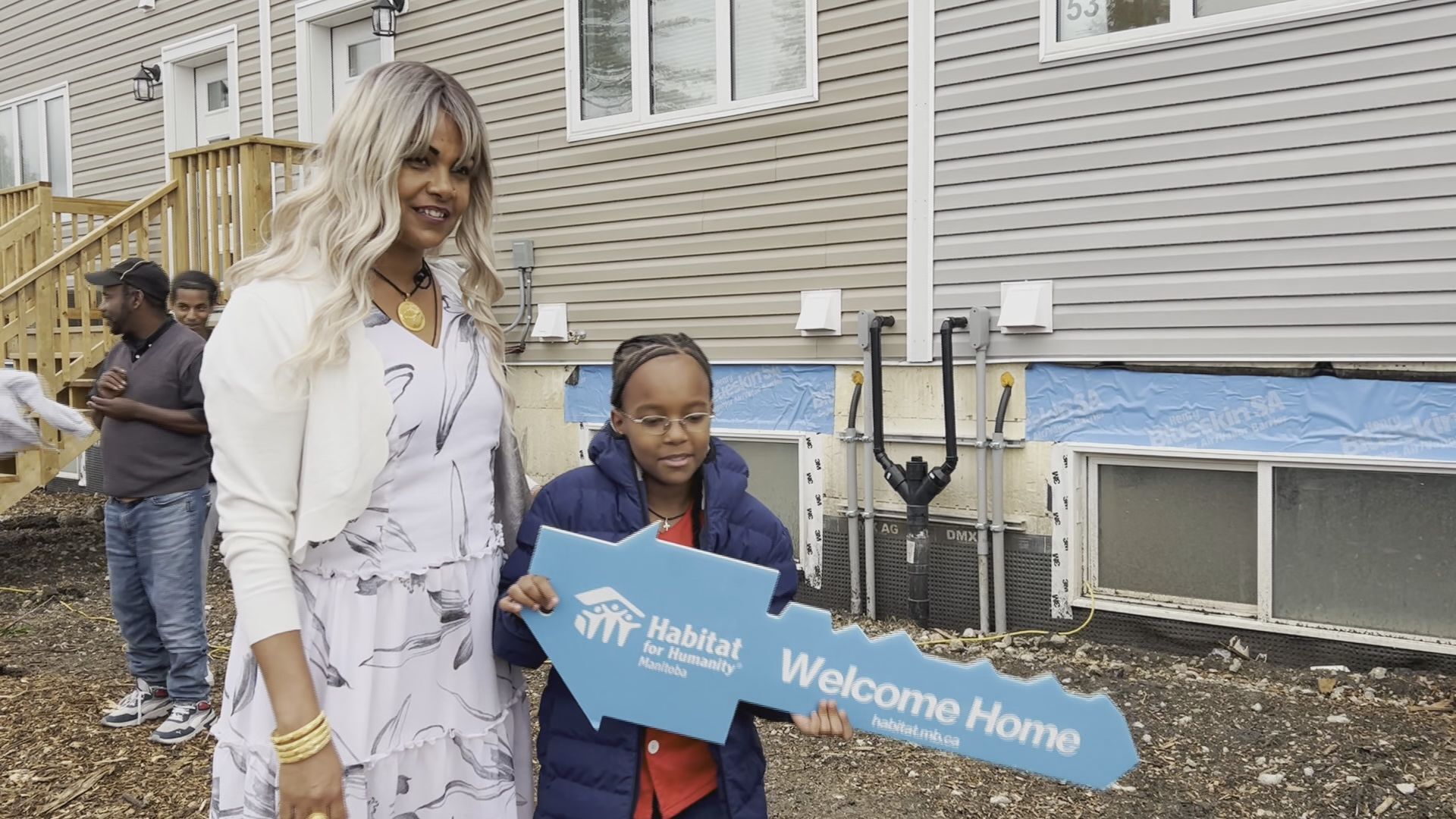 The lives of 15 families is forever changed, as Habitat for Humanity hands over the keys to their new homes