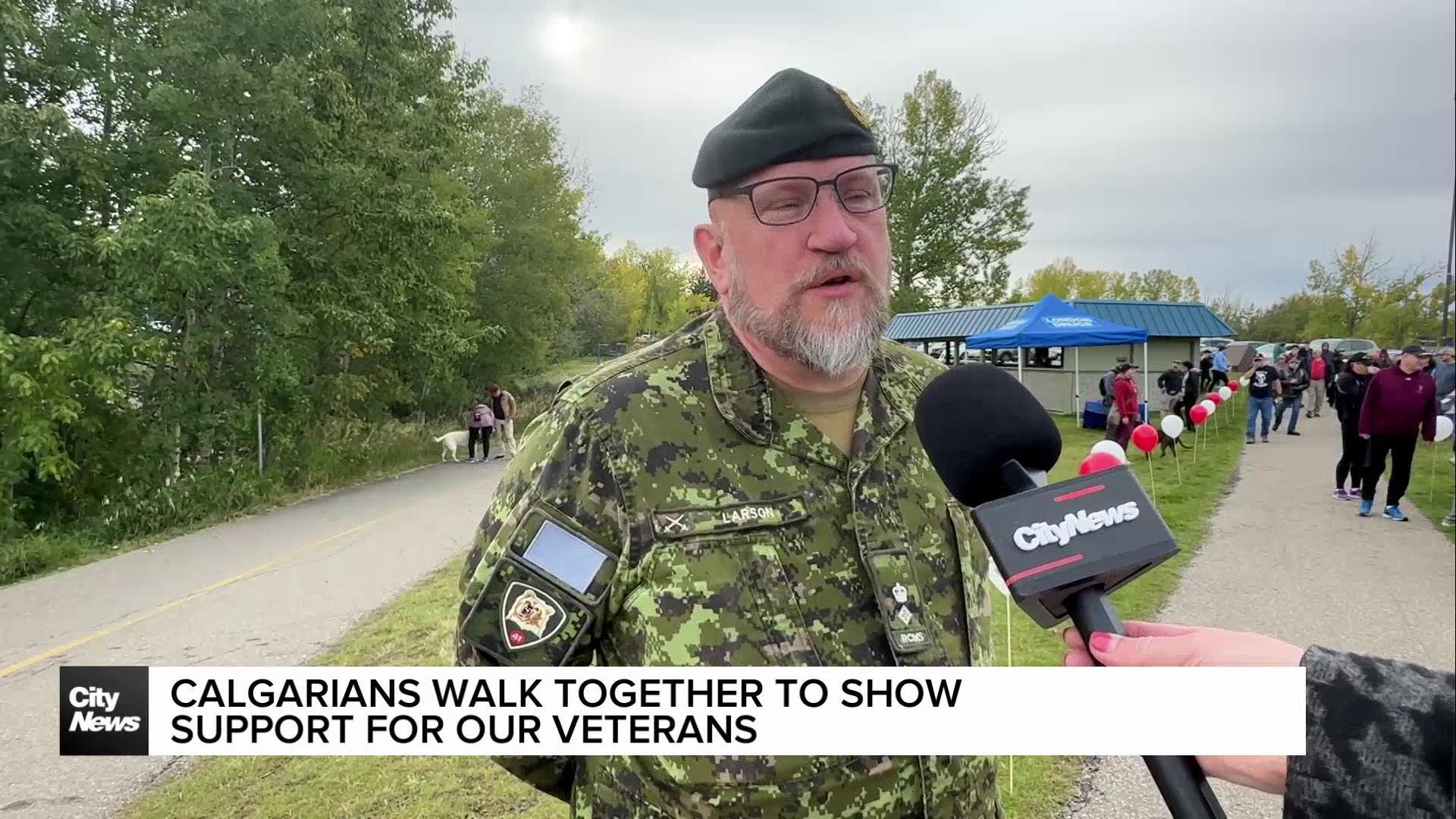 Calgarians walk together to show support for veterans