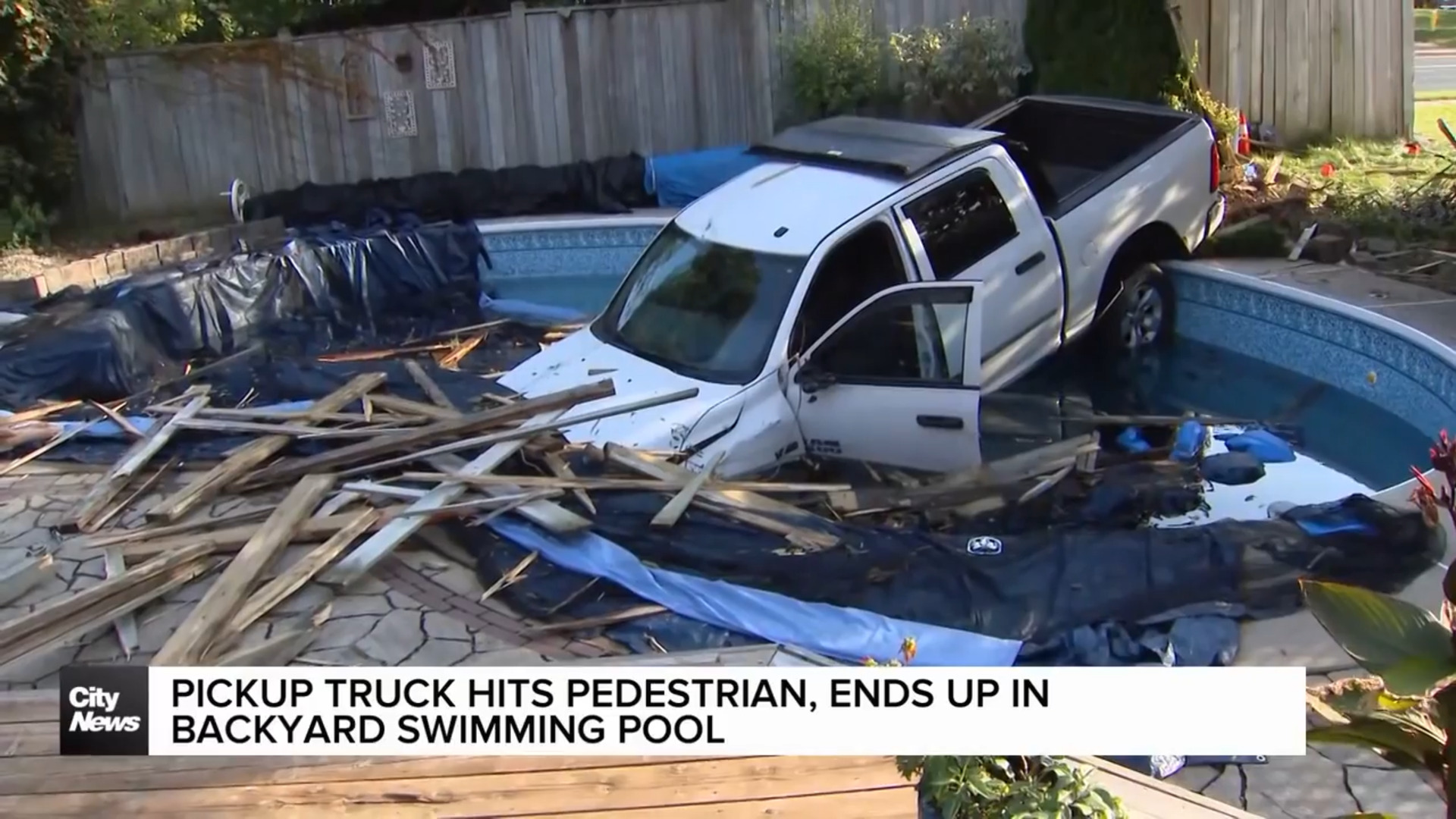 Pickup truck hits pedestrian in Whitby, lands in backyard swimming pool