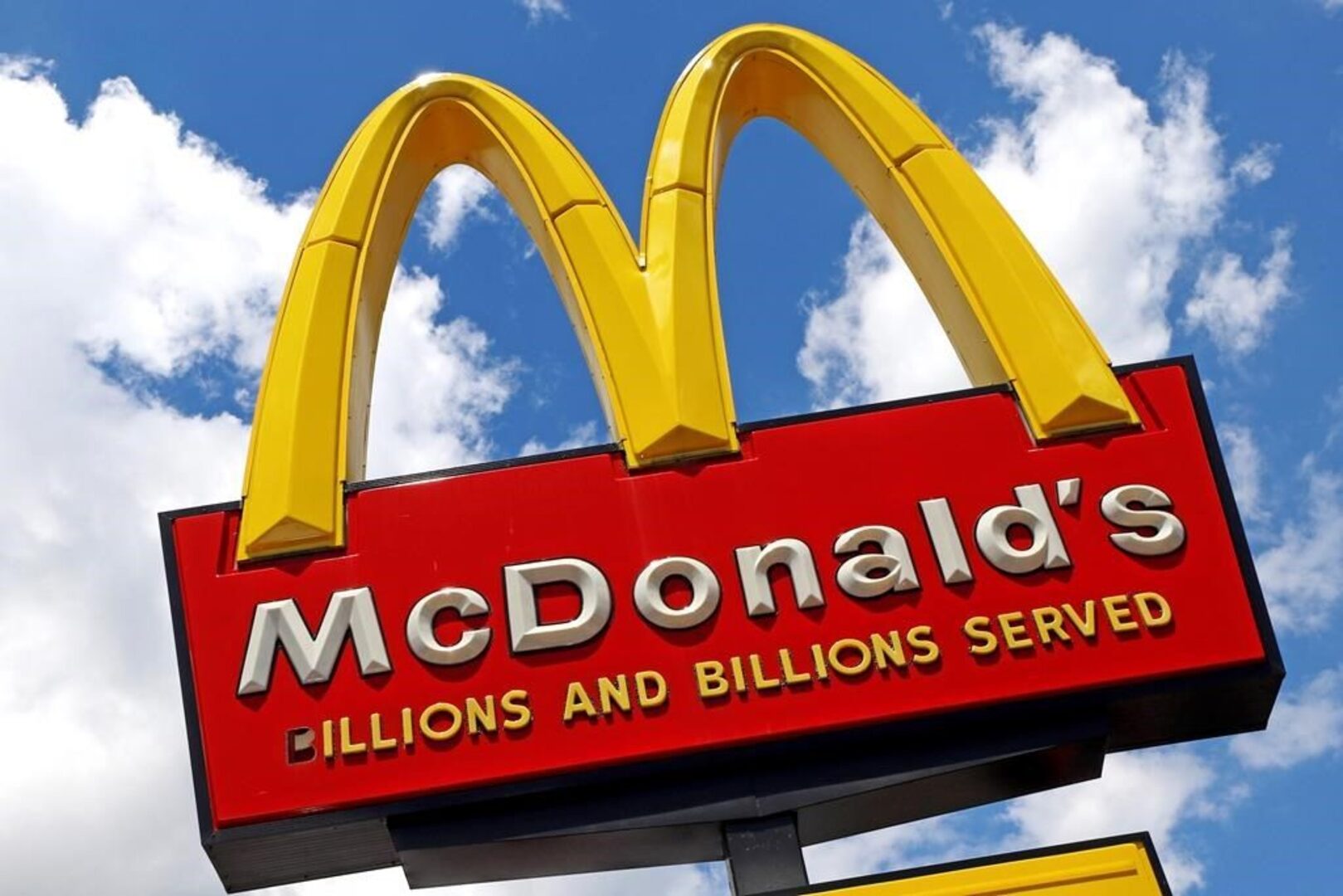 Business Report: McDonald's experimenting with cash kiosks