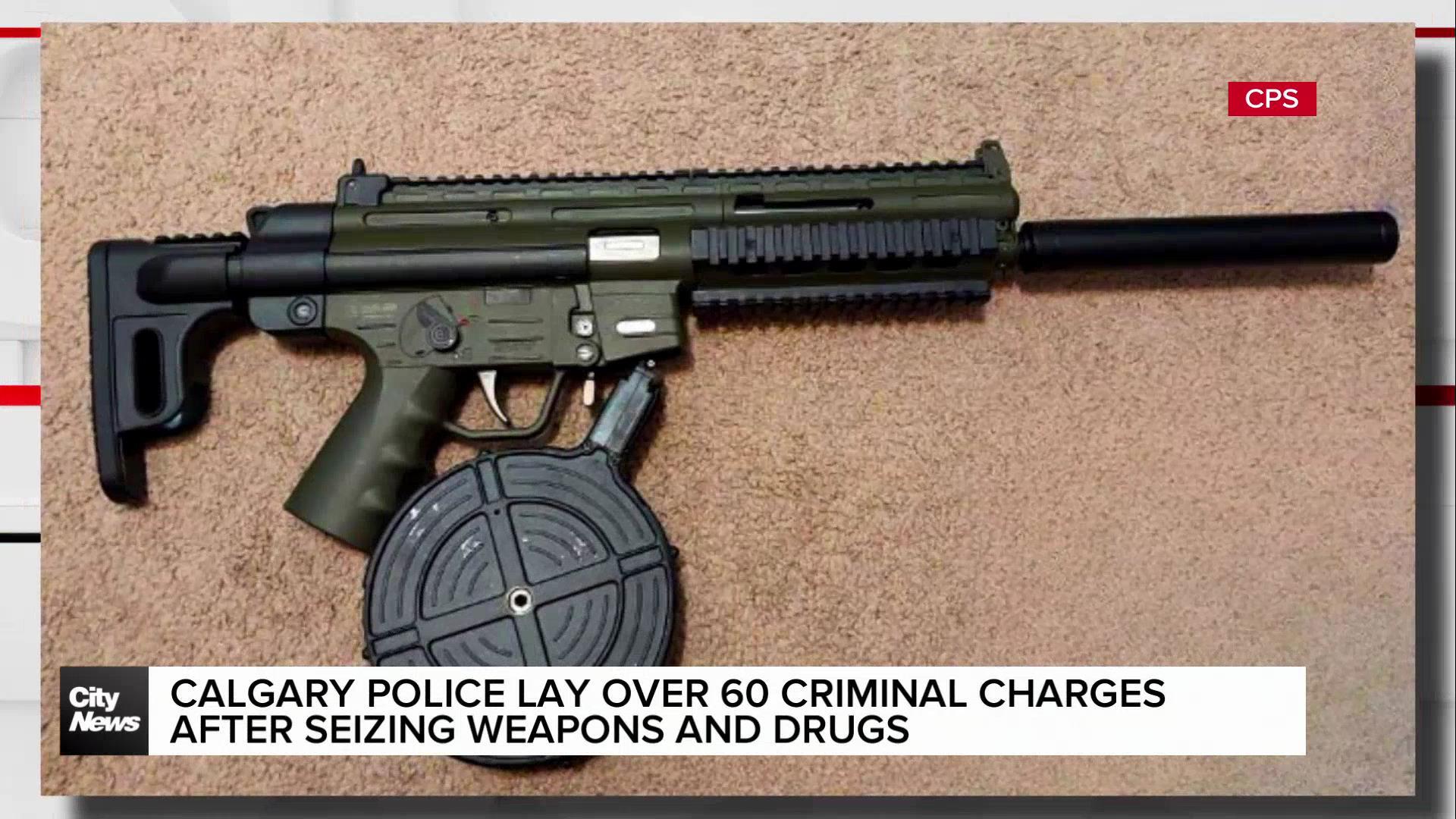 Calgary police lay over 60 charges after weapons and drugs seizure