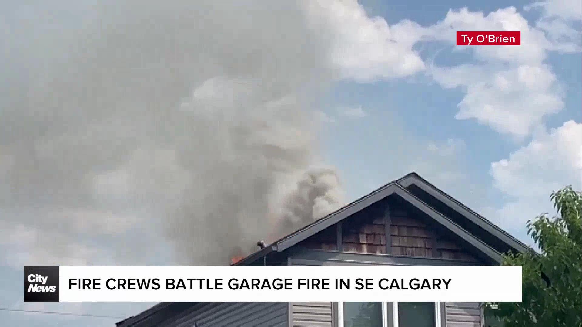 Fire crews battle garage fire in SE Calgary