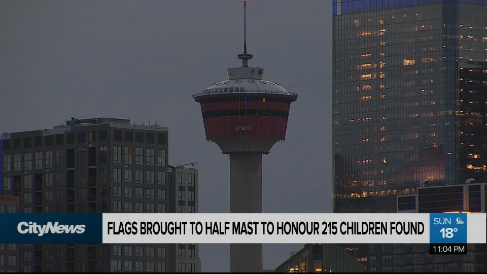 Flags lowered to halfmast and Calgary Tower plunged into darkness