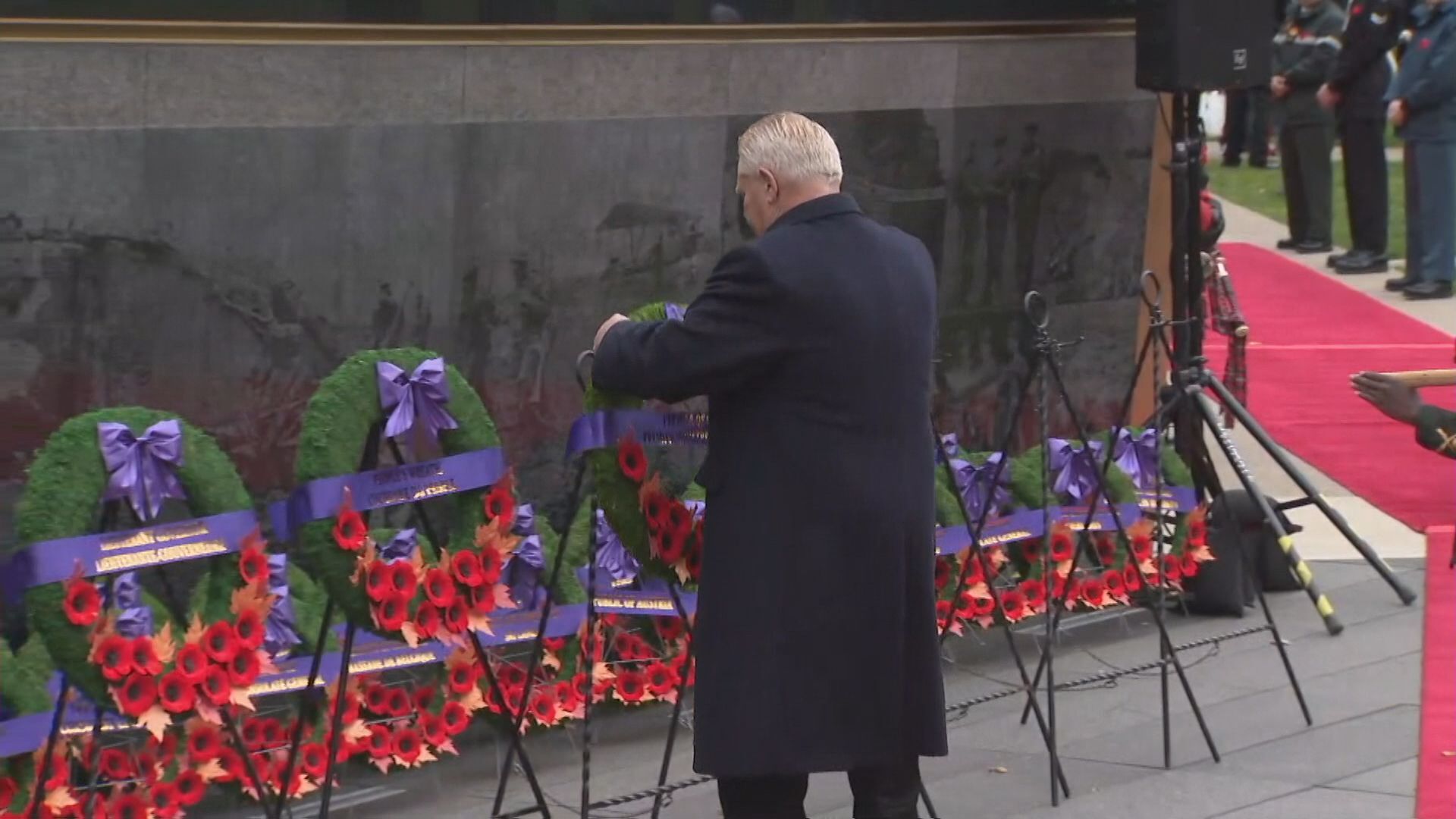 Provincial officials gather at Queen's Park to mark Remembrance Day