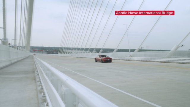 Family of the hockey great first to cross as Gordie Howe bridge opens to traffic