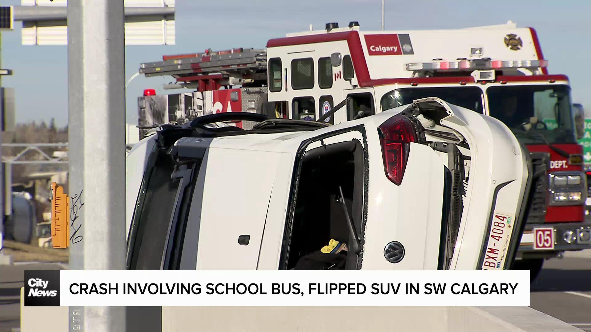 Crash involving school bus, flipped SUV in SW Calgary