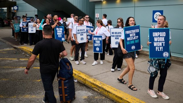 WestJet flight attendants on strike, leaving thousands of passengers scrambling