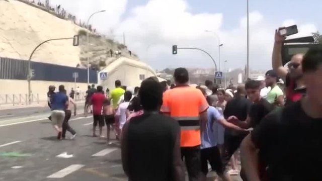 At least 57 migrants dead after thousands breach Spain's Ceuta border