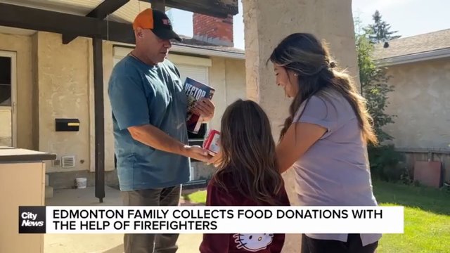 Edmonton families collect food donations with the help of firefighters
