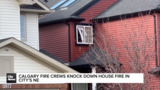 Calgary fire crews knock down house fire in city's NE