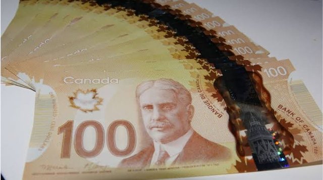 Bank of Canada holds interest rates steady but predicts economic rebound