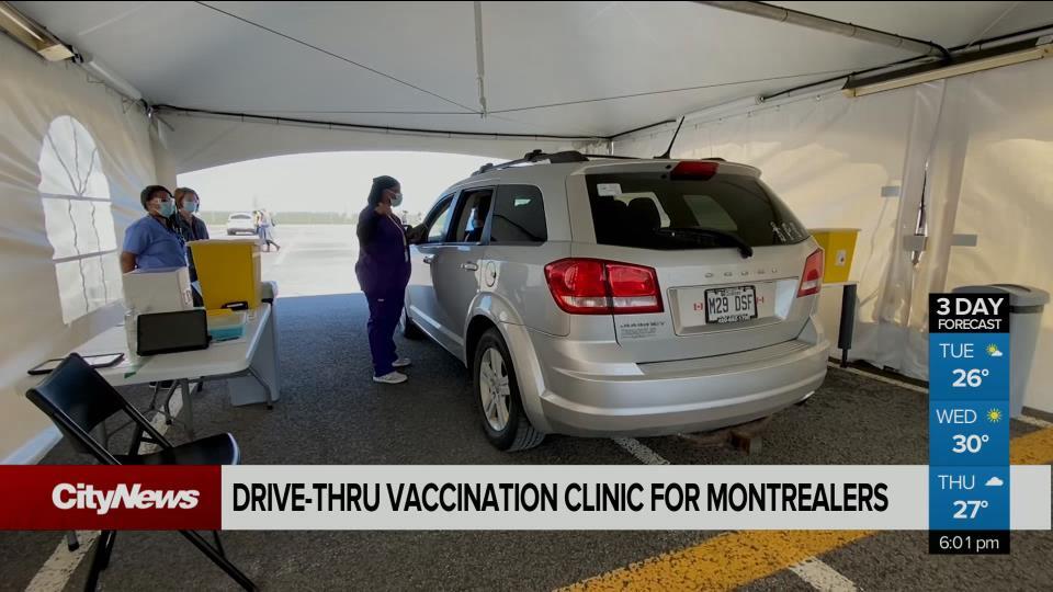 Montrealers get vaccinated in their cars