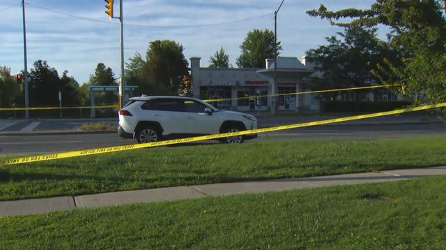 Woman hospitalized with life-threatening injuries after being struck by vehicle
