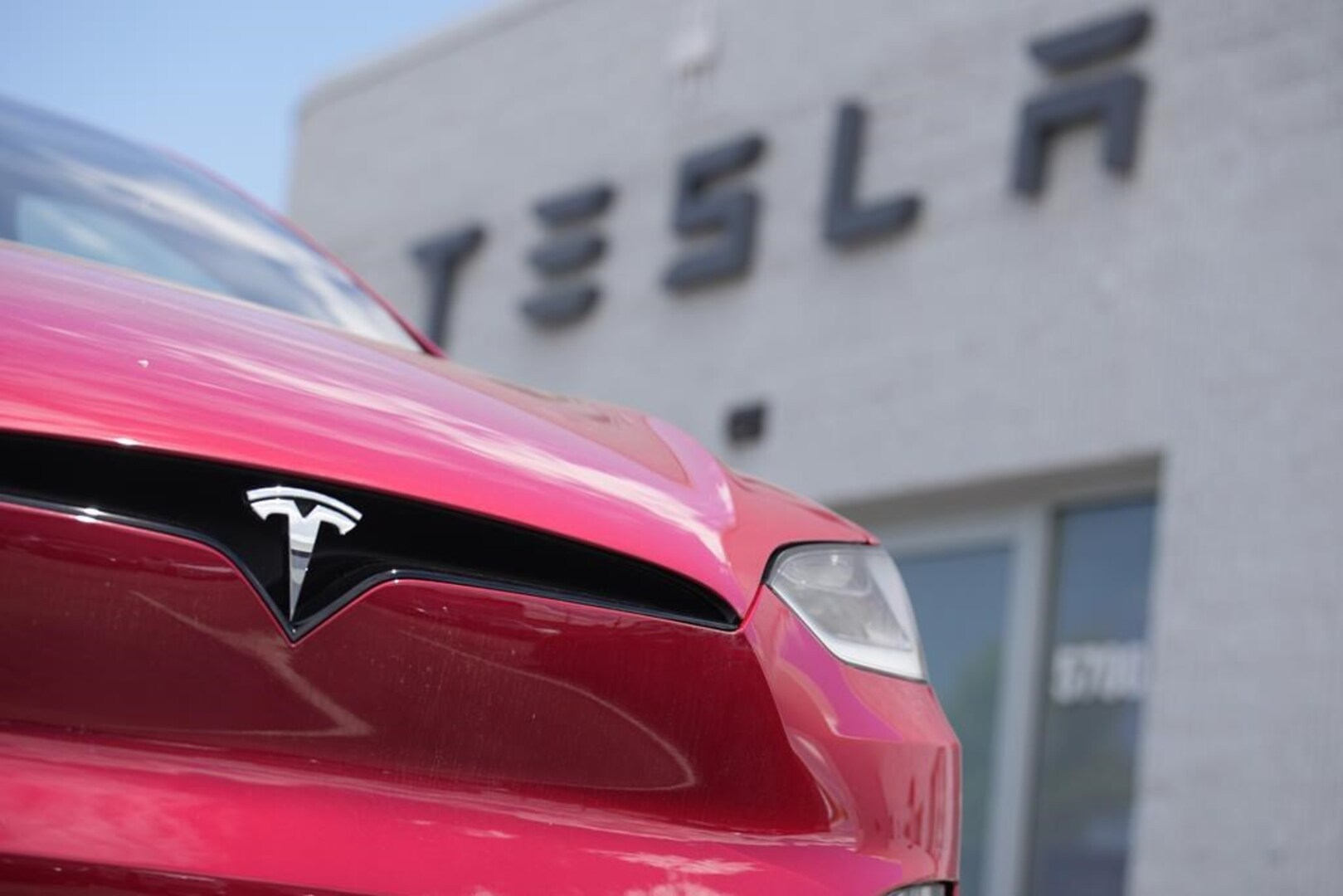 Business Report: Tesla trying to regain foothold