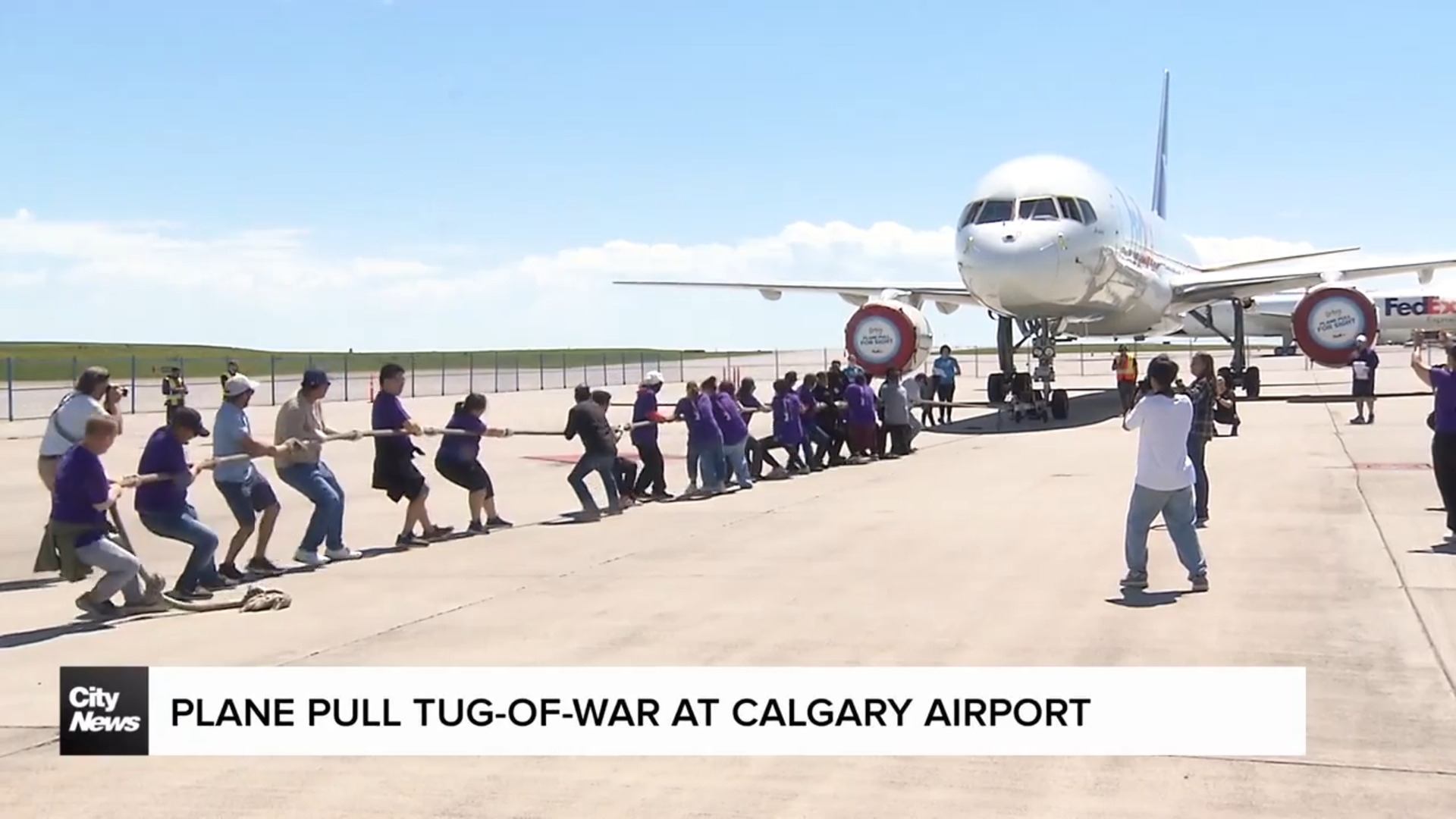 Plane pull tug-of-war gets underway at Calgary Airport