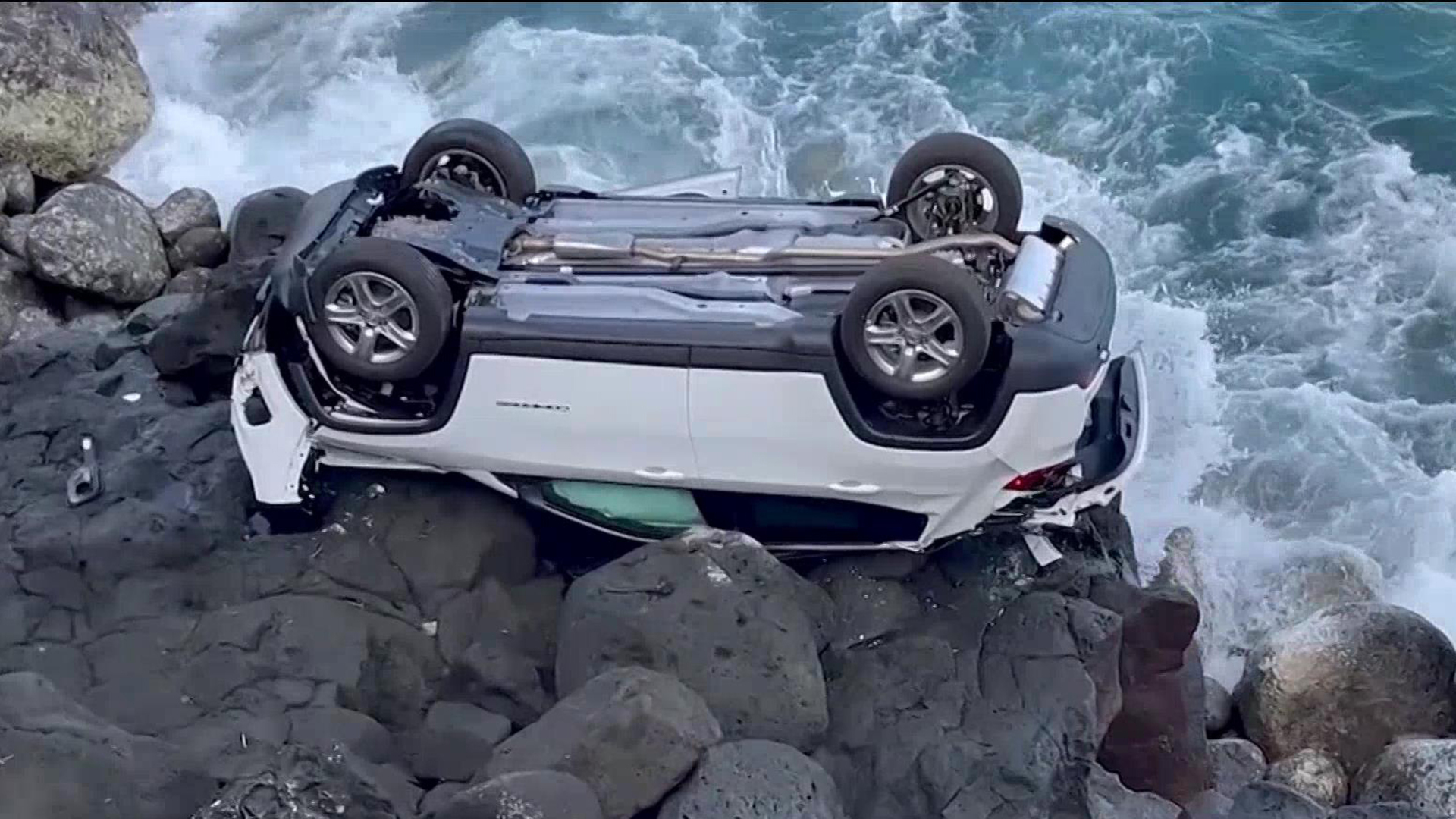 Canadian tourist survives after driving car off cliff in Hawaii