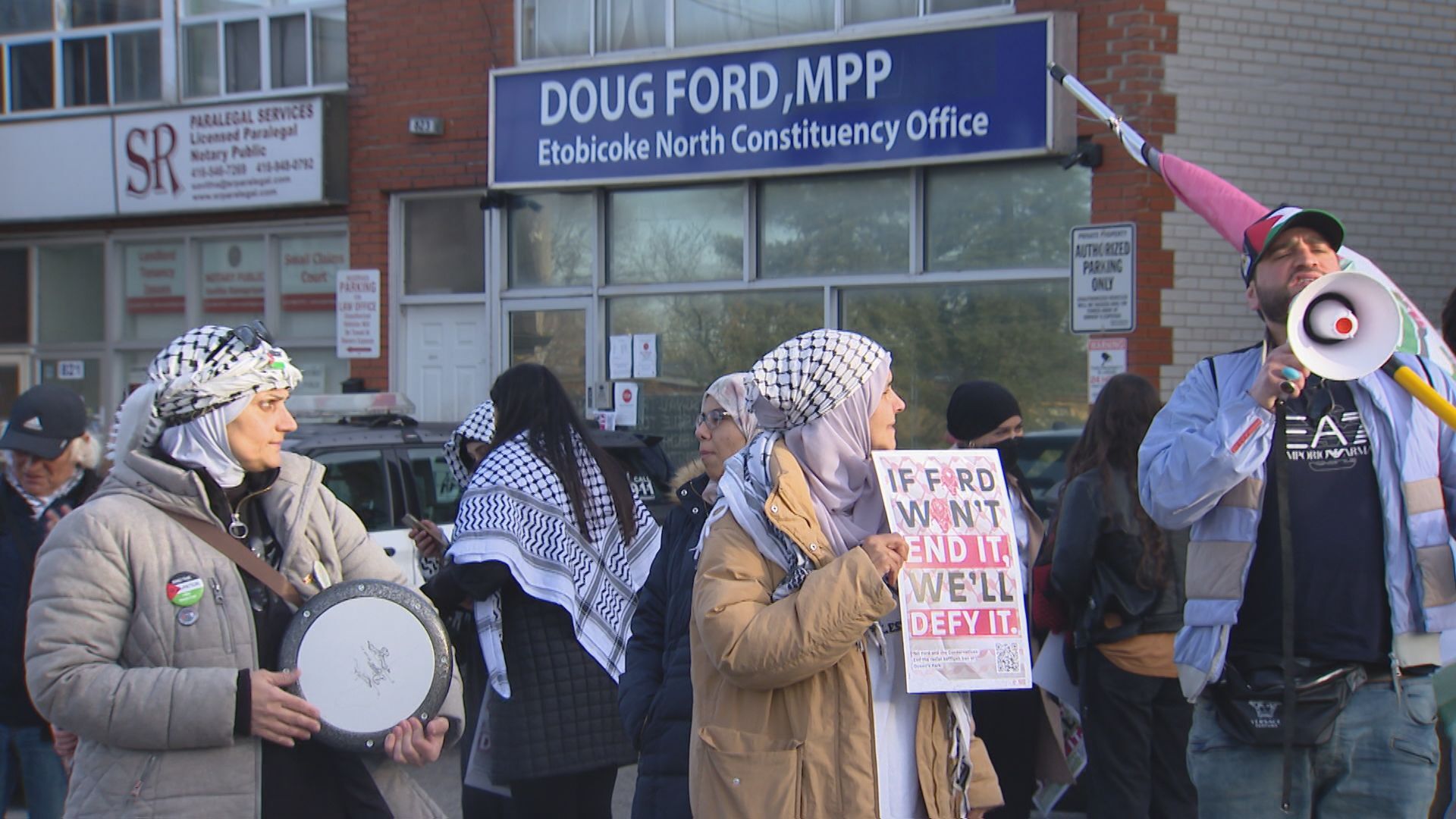 Rally held to reverse controversial keffiyeh ban at Queens Park