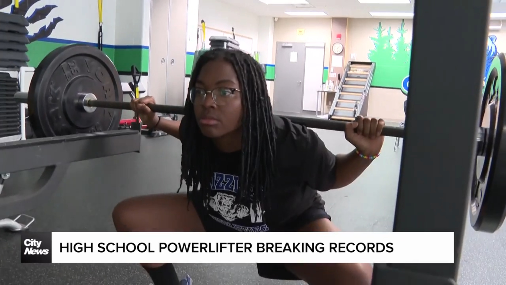 High school power lifter breaking records 